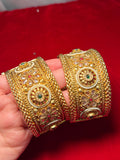 Gold plated kangan/kada with red & green stones