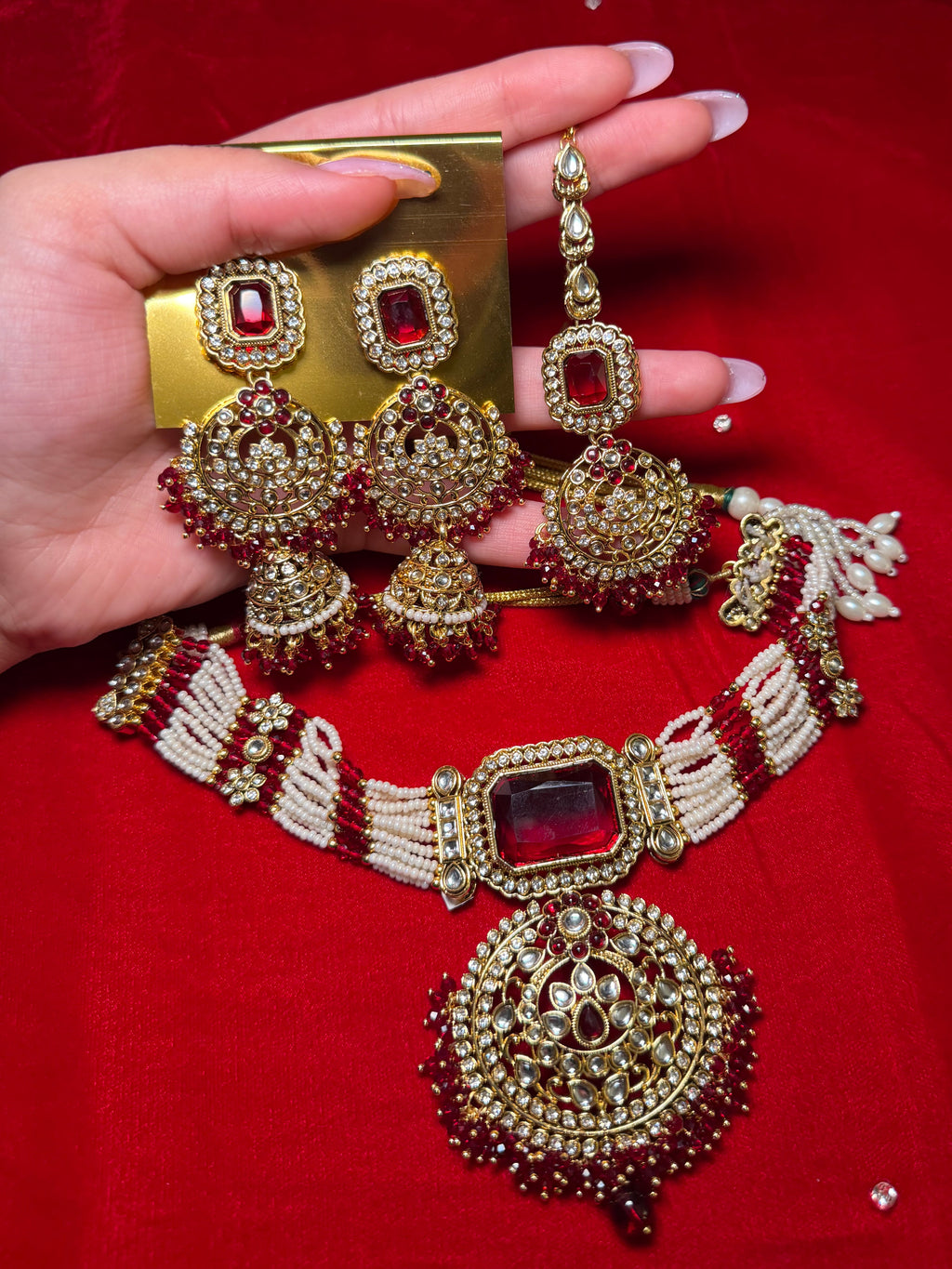 Maroon with white pearls choker set with jhumka earrings & tikka