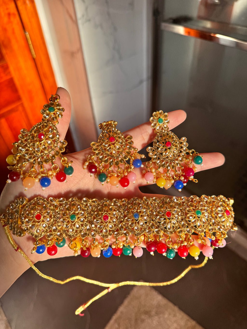 Multicolor & golden kundan choker set with tikka & earrings