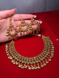 Next to real gold necklace set with tikka