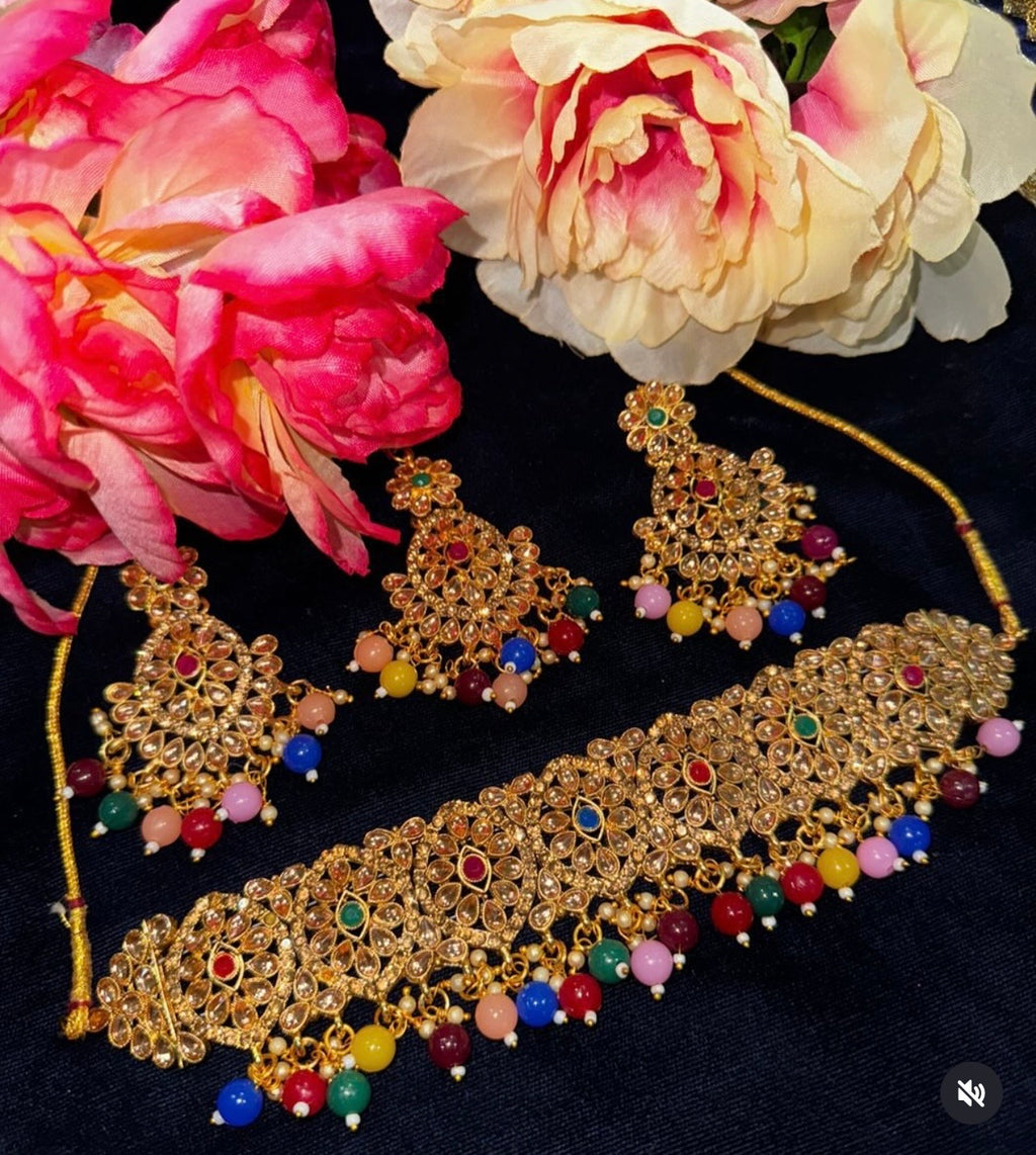 Multicolor & golden kundan choker set with tikka & earrings