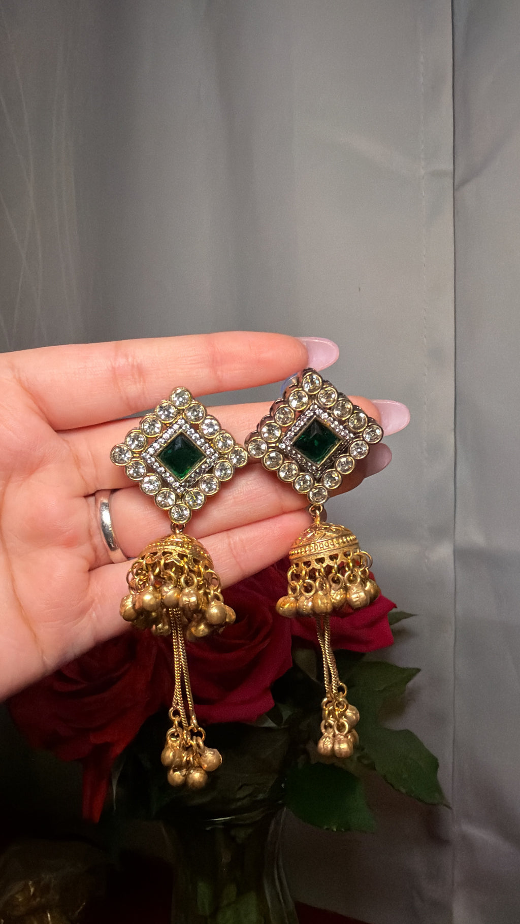 Kashmiri earrings with general green stones with golden ghungru