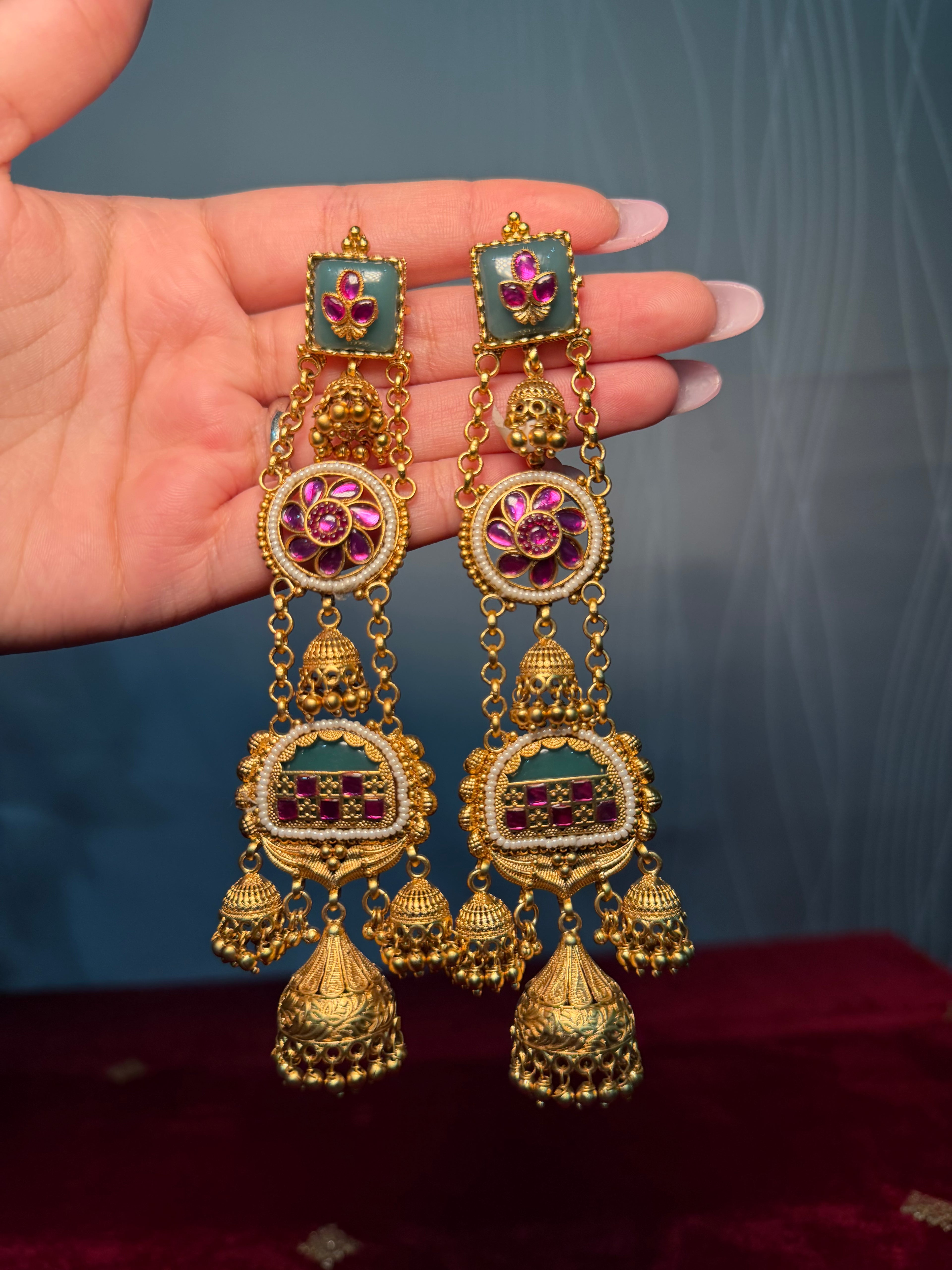 Gold plated kashmiri earrings with royal designs