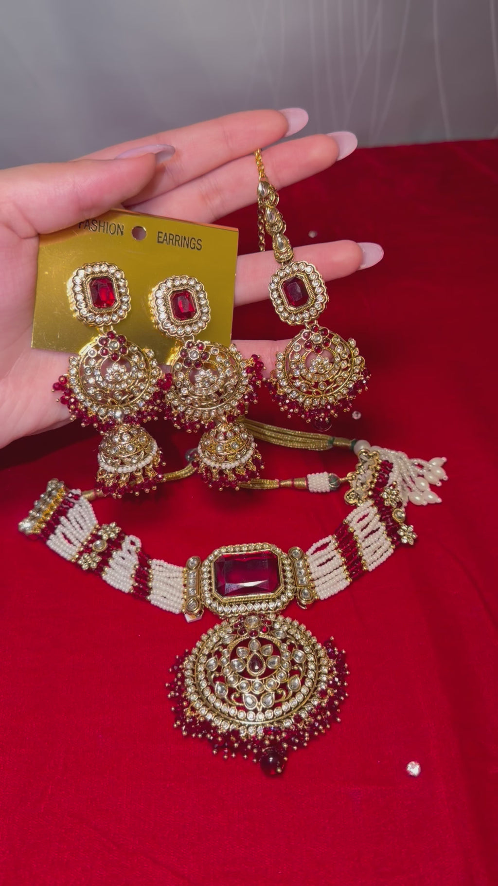 Maroon with white pearls choker set with jhumka earrings & tikka