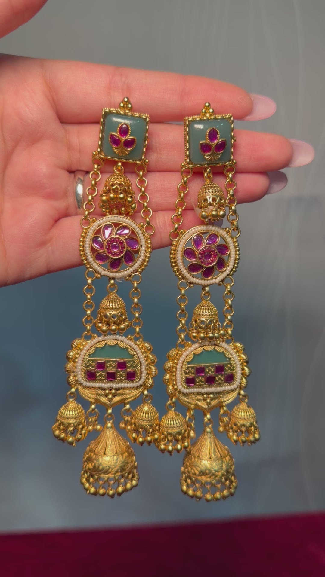 Gold plated kashmiri earrings with royal designs