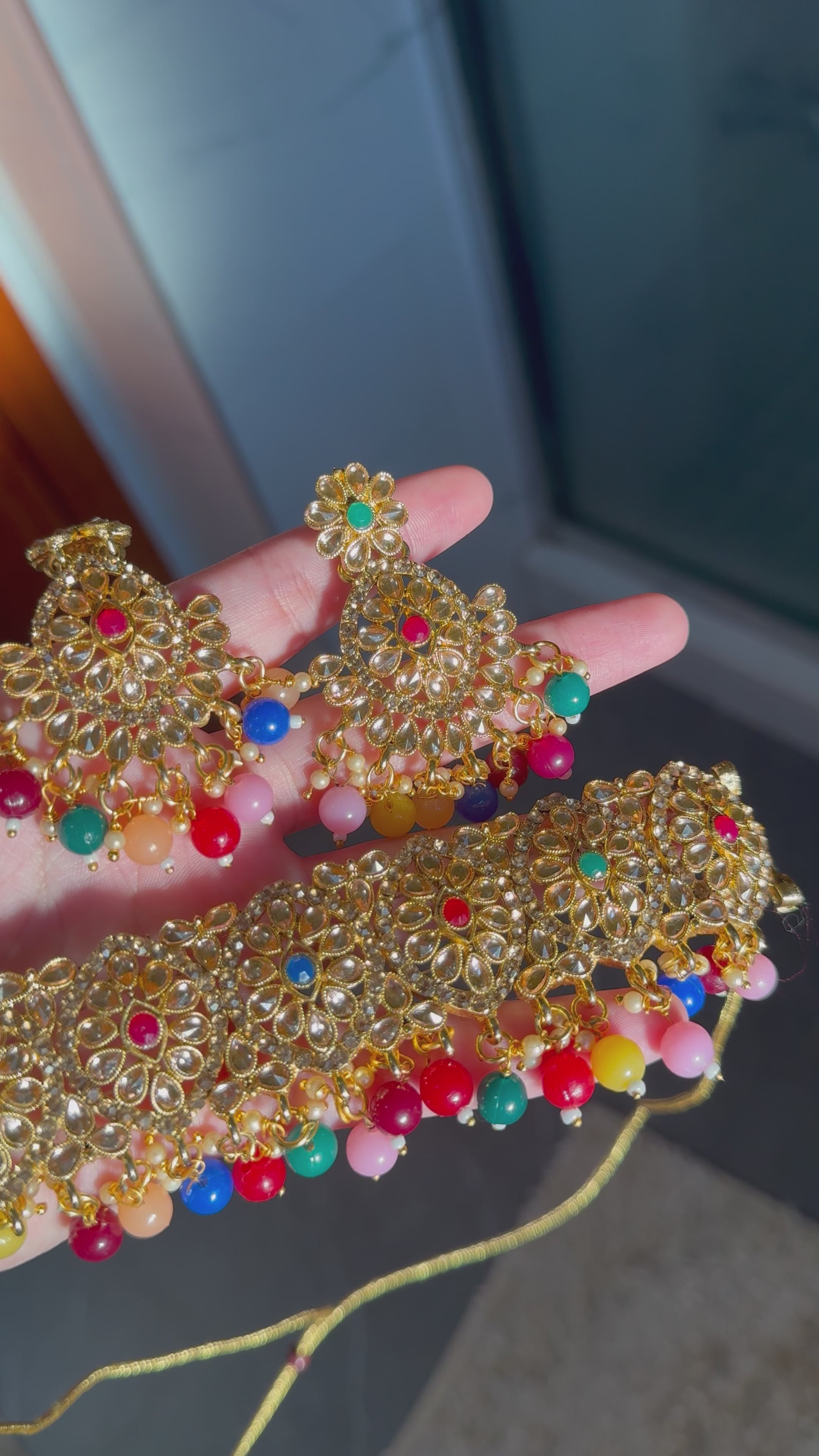 Multicolor & golden kundan choker set with tikka & earrings