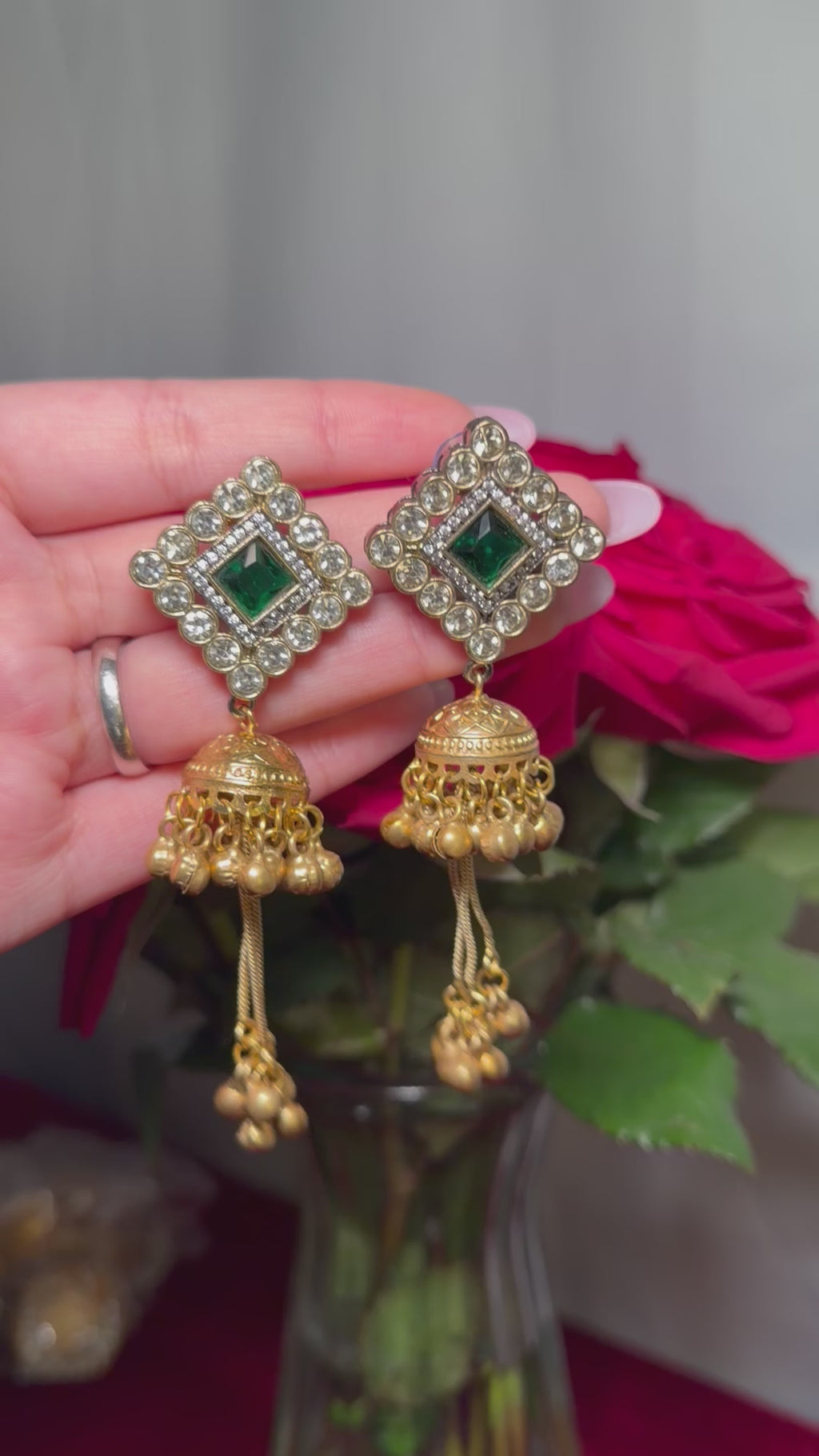 Kashmiri earrings with general green stones with golden ghungru
