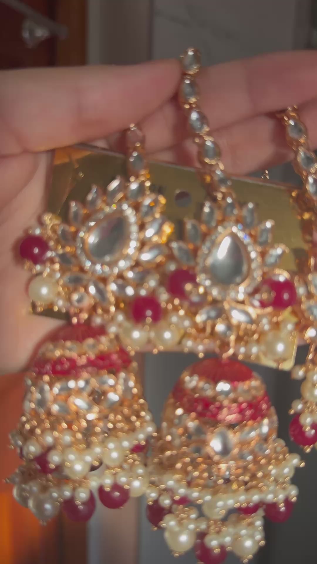Oversized maroon jhumka with tikka
