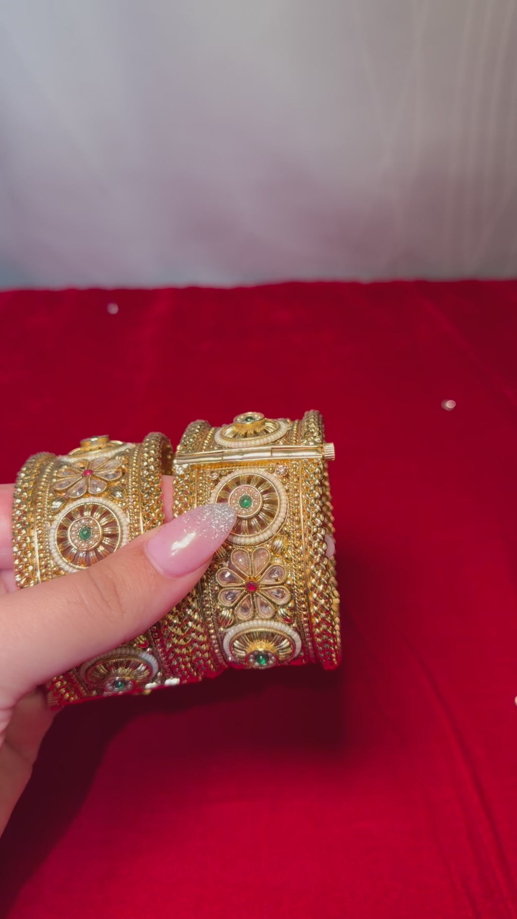 Gold plated kangan/kada with red & green stones