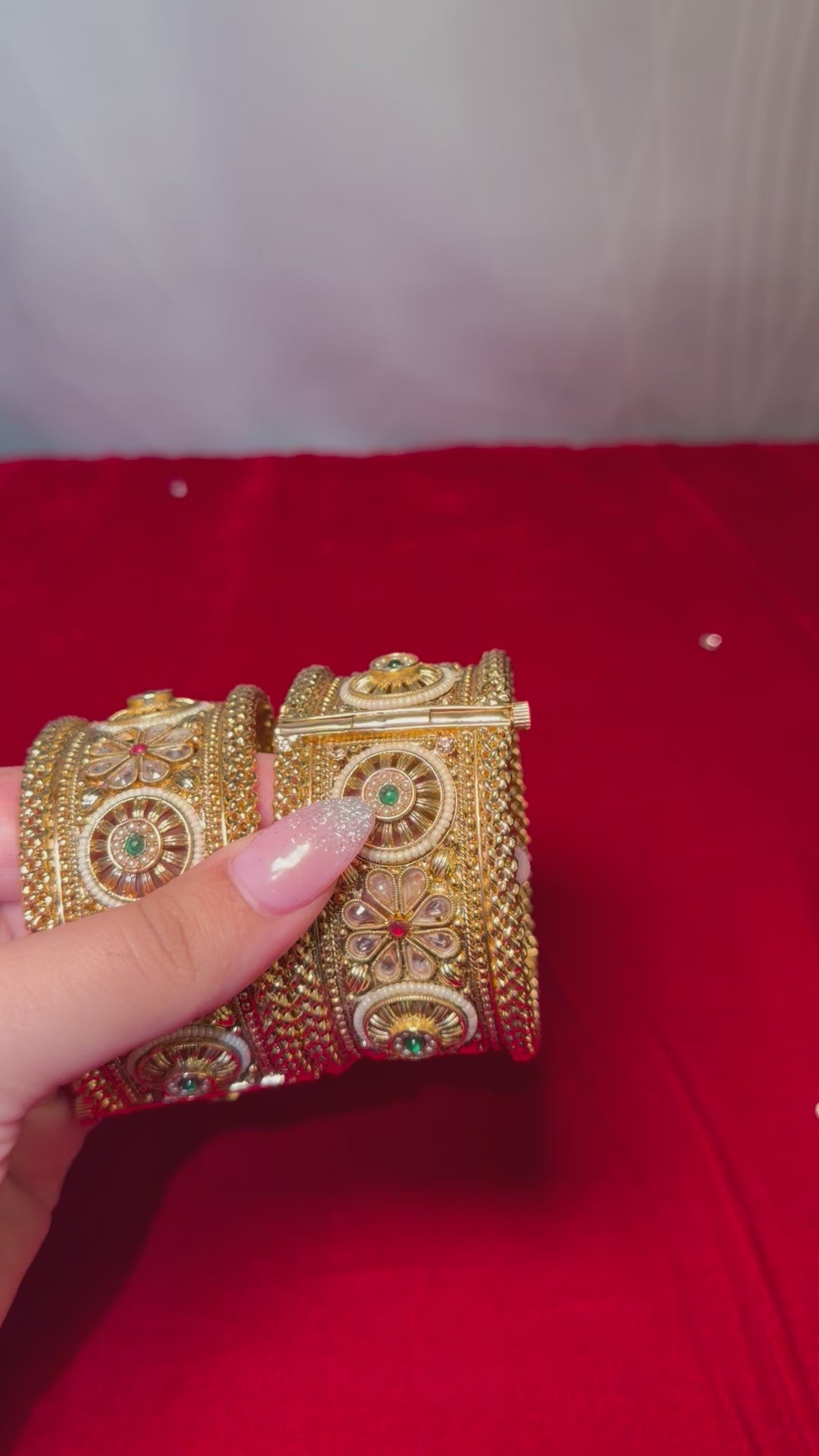Gold plated kangan/kada with red & green stones